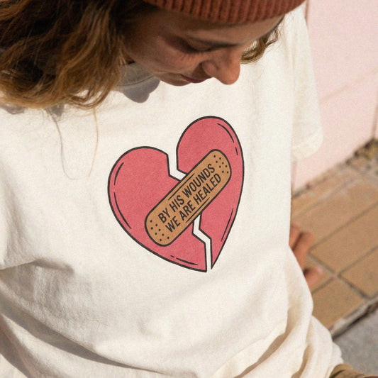 By His Wound Heavyweight Tee