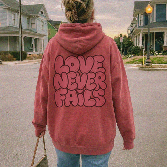 Mercy & More Hoodie Love Never Fails Hoodie